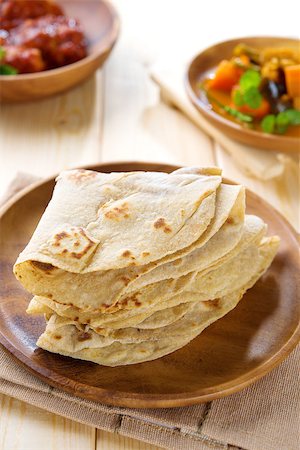 Chapati or chapatti, Indian dhal and chicken curry, popular Indian food. Stock Photo - Budget Royalty-Free & Subscription, Code: 400-06922071
