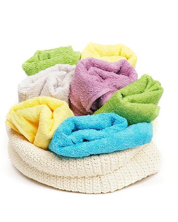 simsearch:400-06564793,k - Multi-colored Terry towels in wattled container isolated on white background Photographie de stock - Aubaine LD & Abonnement, Code: 400-06922080