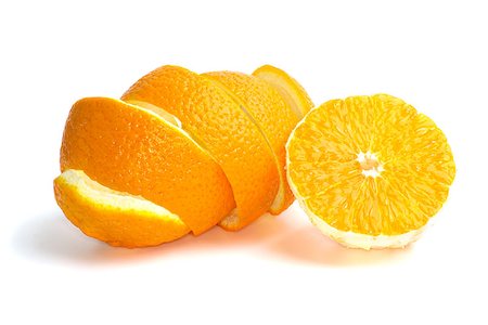 Half of an orange and some peel isolated on the white background Foto de stock - Super Valor sin royalties y Suscripción, Código: 400-06922249