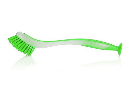 simsearch:400-06922404,k - Green cleaning brush. Isolated on white background Fotografie stock - Microstock e Abbonamento, Codice: 400-06922375