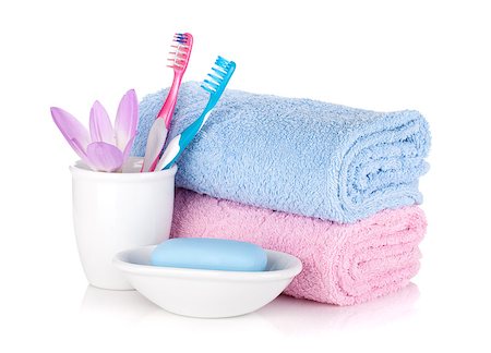 simsearch:400-04789848,k - Toothbrushes, soap and two towels. Isolated on white background Stock Photo - Budget Royalty-Free & Subscription, Code: 400-06922389