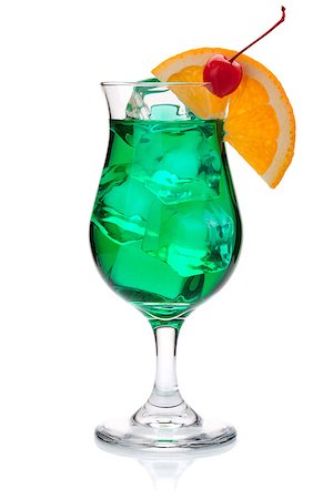 simsearch:400-06915457,k - Green tropical cocktail with orange and maraschino. Isolated on white Photographie de stock - Aubaine LD & Abonnement, Code: 400-06922408