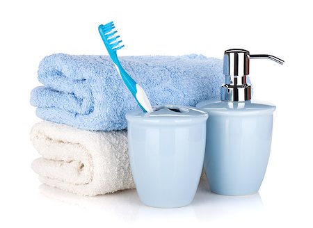simsearch:400-04789848,k - Toothbrush, soap and two towels. Isolated on white background Stock Photo - Budget Royalty-Free & Subscription, Code: 400-06922401