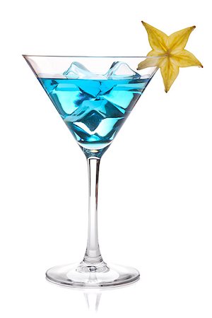 simsearch:400-06915457,k - Blue cocktail with carambola in martini glass. Isolated on white Photographie de stock - Aubaine LD & Abonnement, Code: 400-06922416