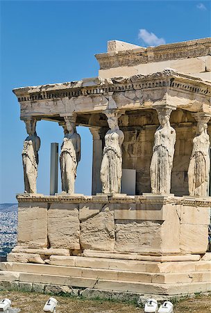 simsearch:400-05909439,k - The Erechtheion is an ancient Greek temple on the north side of the Acropolis of Athens in Greece which was dedicated to both Athena and Poseidon. Foto de stock - Super Valor sin royalties y Suscripción, Código: 400-06922898