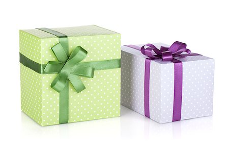 simsearch:400-06360703,k - Two colorful gift boxes with ribbon and bow. Isolated on white background Stockbilder - Microstock & Abonnement, Bildnummer: 400-06923170