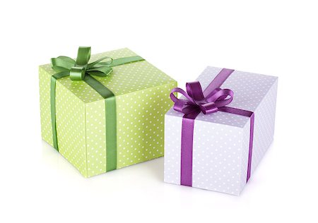 simsearch:400-06360703,k - Two colorful gift boxes with ribbon and bow. Isolated on white background Stockbilder - Microstock & Abonnement, Bildnummer: 400-06923171