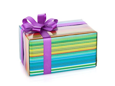 simsearch:400-04805110,k - Colorful gift box with ribbon and bow. Isolated on white background Stock Photo - Budget Royalty-Free & Subscription, Code: 400-06923181