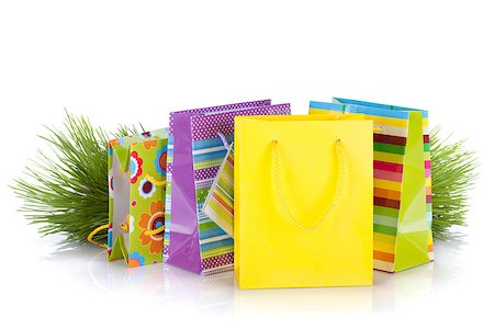 simsearch:400-04231102,k - Colorful gift bags with christmas gifts. Isolated on white background Photographie de stock - Aubaine LD & Abonnement, Code: 400-06923226