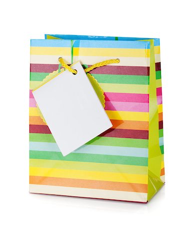 simsearch:400-04231102,k - Colored gift bag. Isolated on white background Photographie de stock - Aubaine LD & Abonnement, Code: 400-06923227