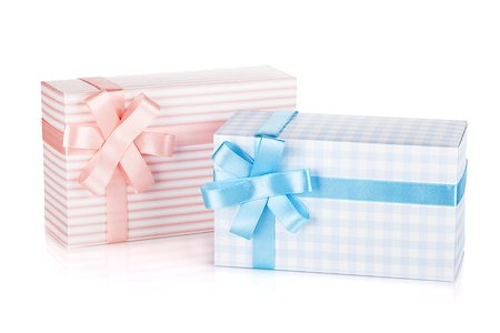 simsearch:400-04805110,k - Two gift boxes with ribbon and bow. Isolated on white background Stock Photo - Budget Royalty-Free & Subscription, Code: 400-06923277