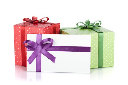 simsearch:400-06360703,k - Colorful gift boxes and letter with ribbon and bow. Isolated on white background Stockbilder - Microstock & Abonnement, Bildnummer: 400-06923284