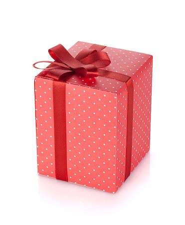 simsearch:400-04805110,k - Red gift box with ribbon and bow. Isolated on white background Stock Photo - Budget Royalty-Free & Subscription, Code: 400-06923282