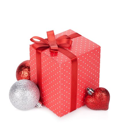 simsearch:400-06360703,k - Gift box with ribbon and bow and christmas decor. Isolated on white background Stockbilder - Microstock & Abonnement, Bildnummer: 400-06923295