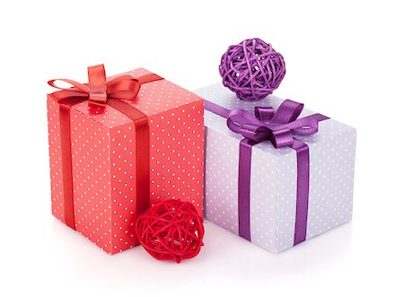 simsearch:400-05674434,k - Colorful gift boxes with ribbon and bow and christmas decor. Isolated on white background Stock Photo - Budget Royalty-Free & Subscription, Code: 400-06923297