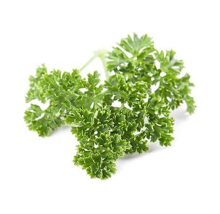 Close-up of fresh organic parsley isolated on white background. Shallow dof Stock Photo - Budget Royalty-Free & Subscription, Code: 400-06923513