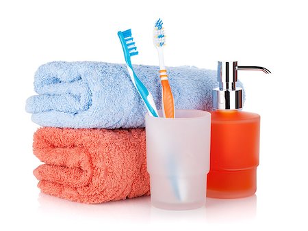 simsearch:400-04789848,k - Toothbrushes, liquid soap and towels. Isolated on white background Stock Photo - Budget Royalty-Free & Subscription, Code: 400-06923525