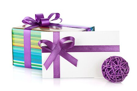 simsearch:400-04805110,k - Colorful gift box and letter with ribbon and bow. Isolated on white background Stock Photo - Budget Royalty-Free & Subscription, Code: 400-06923527