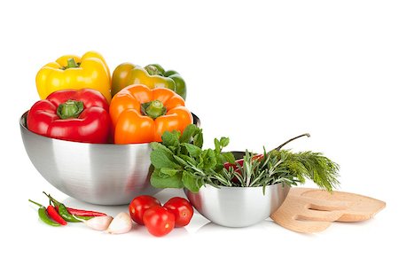 simsearch:400-07211737,k - Fresh bell peppers and herbs in bowls. Isolated on white background Photographie de stock - Aubaine LD & Abonnement, Code: 400-06923531