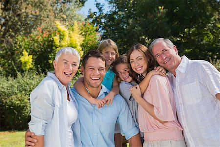 simsearch:693-03304775,k - Smiling family and grandparents in the countryside looking at camera Stock Photo - Budget Royalty-Free & Subscription, Code: 400-06934099