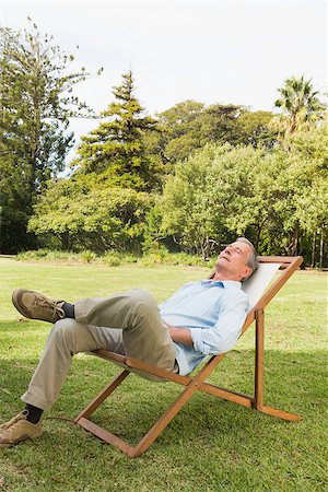 deckchair senior man - Happy man resting in sun lounger at park Stock Photo - Budget Royalty-Free & Subscription, Code: 400-06934177