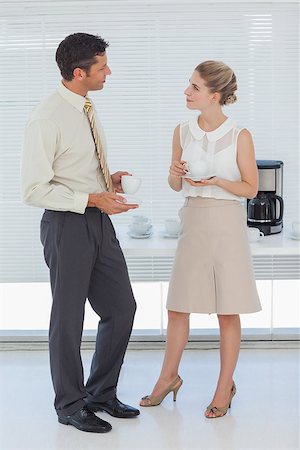 Stylish colleagues having coffee together in break room Stock Photo - Budget Royalty-Free & Subscription, Code: 400-06934566