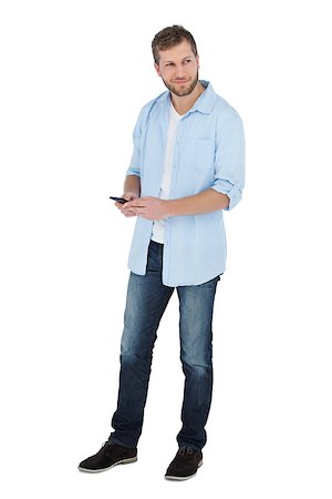 Handsome model with phone on white background Stock Photo - Budget Royalty-Free & Subscription, Code: 400-06931695