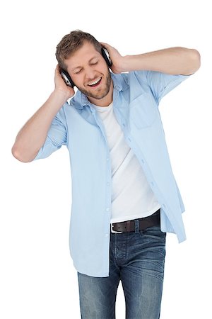 simsearch:400-06690896,k - Trendy model on white background listening to music Stock Photo - Budget Royalty-Free & Subscription, Code: 400-06931725