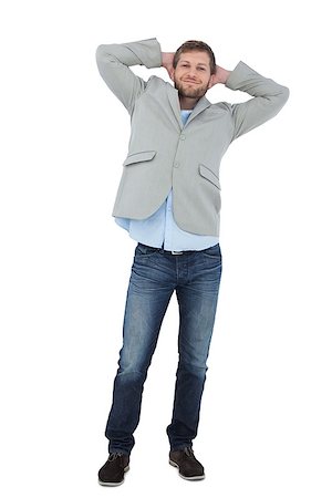 Suave man in a blazer with hands behind head looking at camera on white background Stock Photo - Budget Royalty-Free & Subscription, Code: 400-06931784