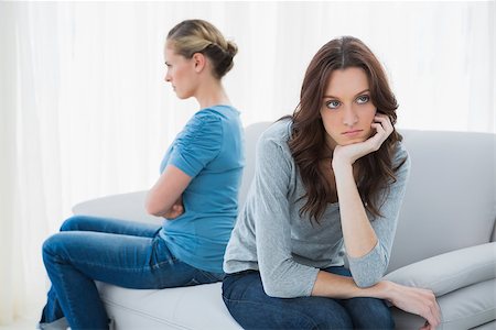 simsearch:400-07059986,k - Angry women after a fight not speaking sitting on the sofa Stock Photo - Budget Royalty-Free & Subscription, Code: 400-06932791