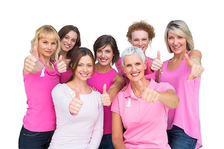 simsearch:400-06932887,k - Positive women posing and wearing pink for breast cancer on white background Fotografie stock - Microstock e Abbonamento, Codice: 400-06932884