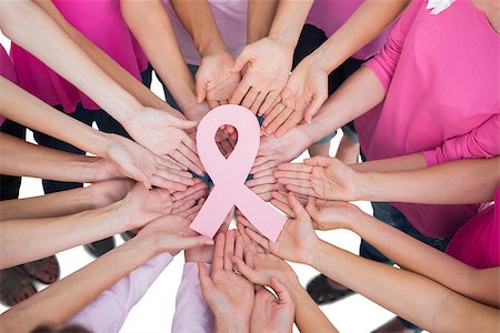 Hands joined in circle holding breast cancer struggle symbol  on white background Stockbilder - Microstock & Abonnement, Bildnummer: 400-06932906