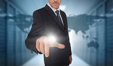 simsearch:400-06890406,k - Businessman touching futuristic interface with world map and data center on background Stock Photo - Budget Royalty-Free & Subscription, Code: 400-06933848