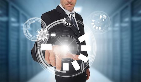 simsearch:400-06886789,k - Businessman using circle interface in data center Stock Photo - Budget Royalty-Free & Subscription, Code: 400-06933864