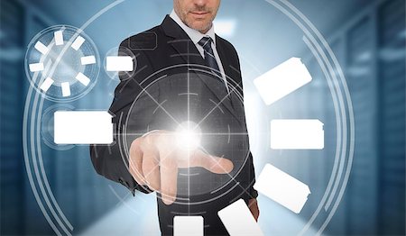 simsearch:400-06886789,k - Businessman using wheel interface in data center Stock Photo - Budget Royalty-Free & Subscription, Code: 400-06933863