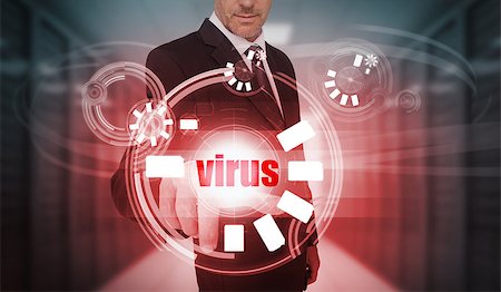 simsearch:400-06933908,k - Businessman touching futuristic virus interface in data center Stock Photo - Budget Royalty-Free & Subscription, Code: 400-06933874