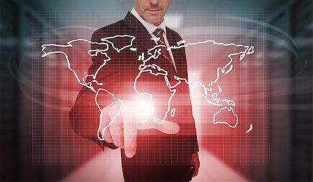simsearch:400-06890468,k - Businessman pressing red world map interface in data center Stock Photo - Budget Royalty-Free & Subscription, Code: 400-06933879