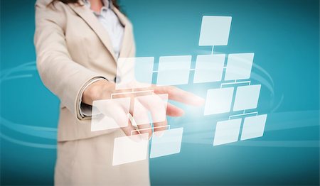 Businesswoman touching futuristic flow chart interface on blue background Foto de stock - Super Valor sin royalties y Suscripción, Código: 400-06933920