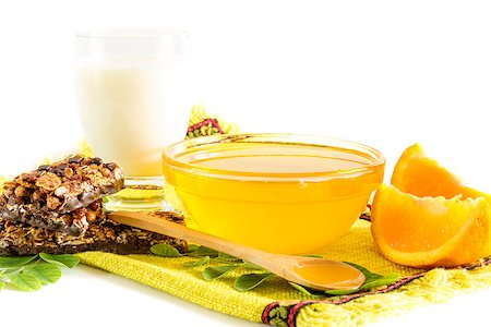 Healthy breakfast with honey, milk and cereals bars Foto de stock - Super Valor sin royalties y Suscripción, Código: 400-06944276