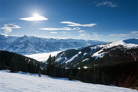 winter with ski slopes of kaprun resort next to kitzsteinhorn peak in austrian alps Photographie de stock - Aubaine LD & Abonnement, Code: 400-06944413