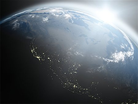 Space view of the sun rising over North America on blue planet Earth. Elements of this image furnished by NASA. Photographie de stock - Aubaine LD & Abonnement, Code: 400-06946258