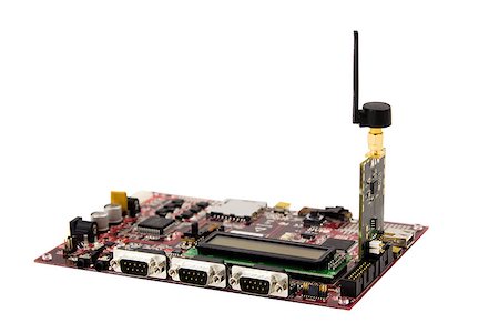 simsearch:400-04916699,k - Electronic Radio board connected to a testing board islated on white Photographie de stock - Aubaine LD & Abonnement, Code: 400-06946747