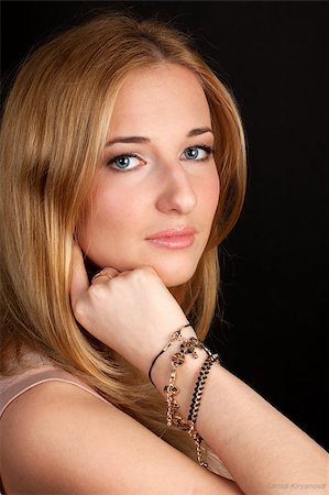 simsearch:400-04363188,k - portrait of the beautiful young fair-haired woman with a bracelet on a hand Stock Photo - Budget Royalty-Free & Subscription, Code: 400-06946786