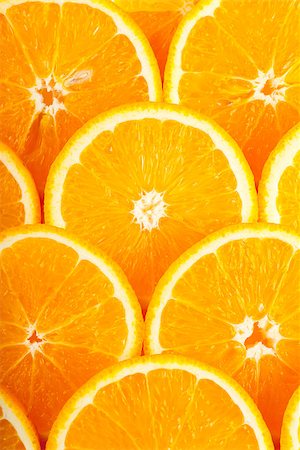 simsearch:400-06862060,k - Abstract background with fresh juicy orange slices Foto de stock - Royalty-Free Super Valor e Assinatura, Número: 400-06946817