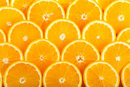 simsearch:400-06862060,k - Abstract background with fresh juicy orange slices Foto de stock - Royalty-Free Super Valor e Assinatura, Número: 400-06946819