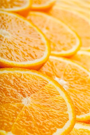 simsearch:400-06862060,k - Abstract background with fresh juicy orange slices Foto de stock - Royalty-Free Super Valor e Assinatura, Número: 400-06946820