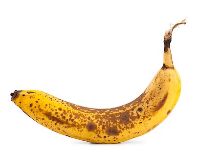 decaying fruit photography - Single overripe banana isolated over white background Stock Photo - Budget Royalty-Free & Subscription, Code: 400-06946821
