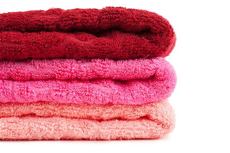 simsearch:400-05029715,k - Stack of bright red and pink towels over white background Stockbilder - Microstock & Abonnement, Bildnummer: 400-06946830