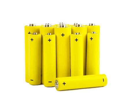 simsearch:400-06109171,k - Bunch of yellow batteries isolated over white background Stock Photo - Budget Royalty-Free & Subscription, Code: 400-06946857