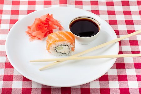 simsearch:689-03123940,k - Sushi, soy and ginger with chopsticks on a white plate Photographie de stock - Aubaine LD & Abonnement, Code: 400-06946850